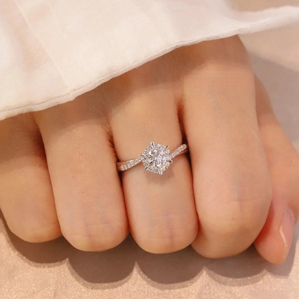 . 50 carat moissonite ring framed with 925 sterling silver