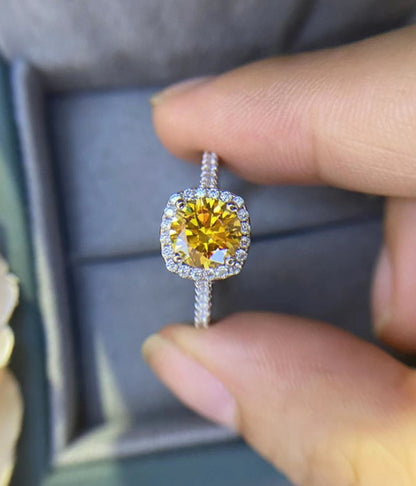 . 50 cent yellow moissonite ring